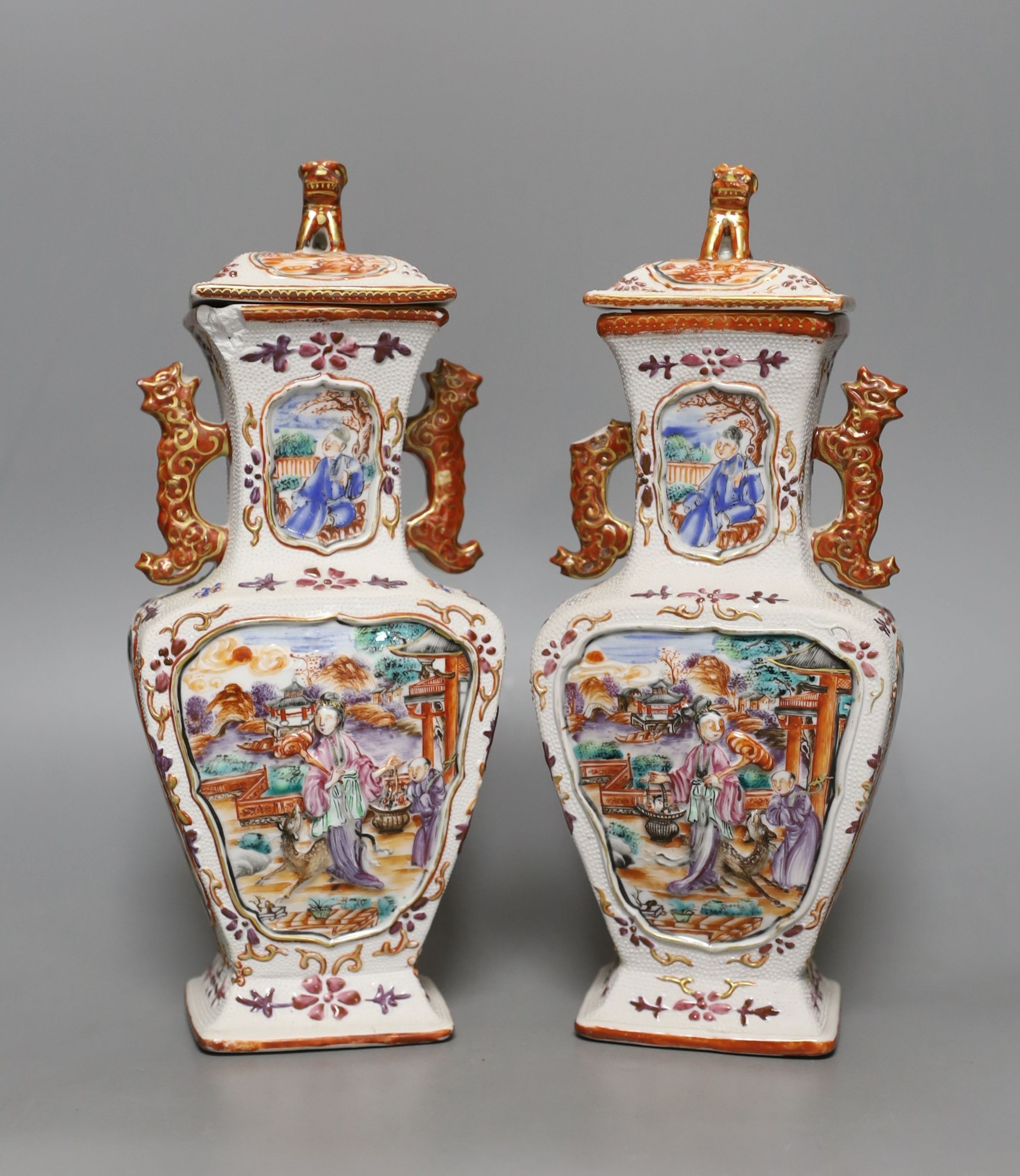 A pair of 18th century Chinese export square form famille rose vases and covers with phoenix handles - 24.5cm tall